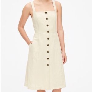 Beige button down apron dress